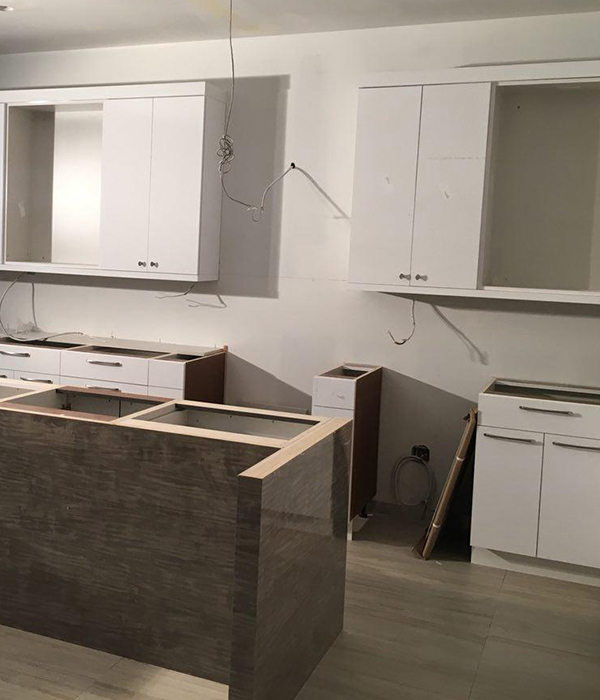 expert installation on white and european laminate kitchen